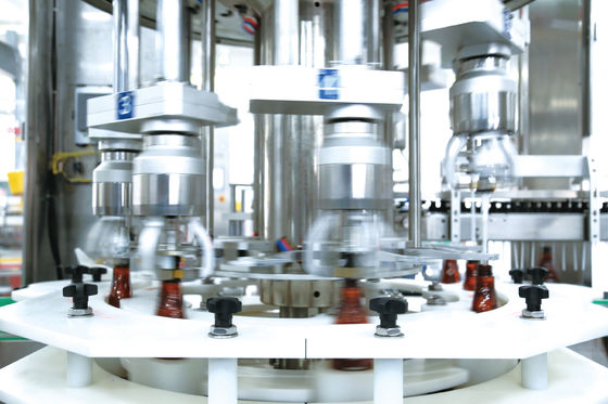Capsuleur semi automatique rotatoire de bouteille de têtes multi