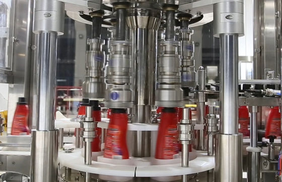 Machine de capsulage de remplissage de bouteilles de structure de trois griffes