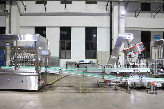 Machine de capsulage automatique Huituo 7200bph pour huile pour bébé à capuchon rond