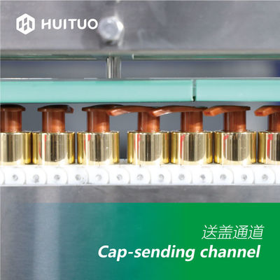Machine de capsulage de servo automatique rotatoire souple de Huituo pour le chapeau de pompe, au dessus du disque et de Yorker de lotion