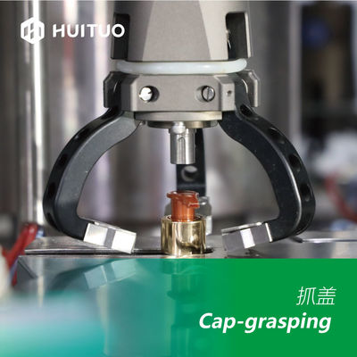 Machine de capsulage de servo automatique rotatoire souple de Huituo pour le chapeau de pompe, au dessus du disque et de Yorker de lotion
