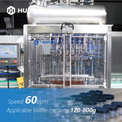 Conteneur en verre de pot avec la machine de remplissage de bouteilles servo de piston de couvercle pour le sirop et le miel